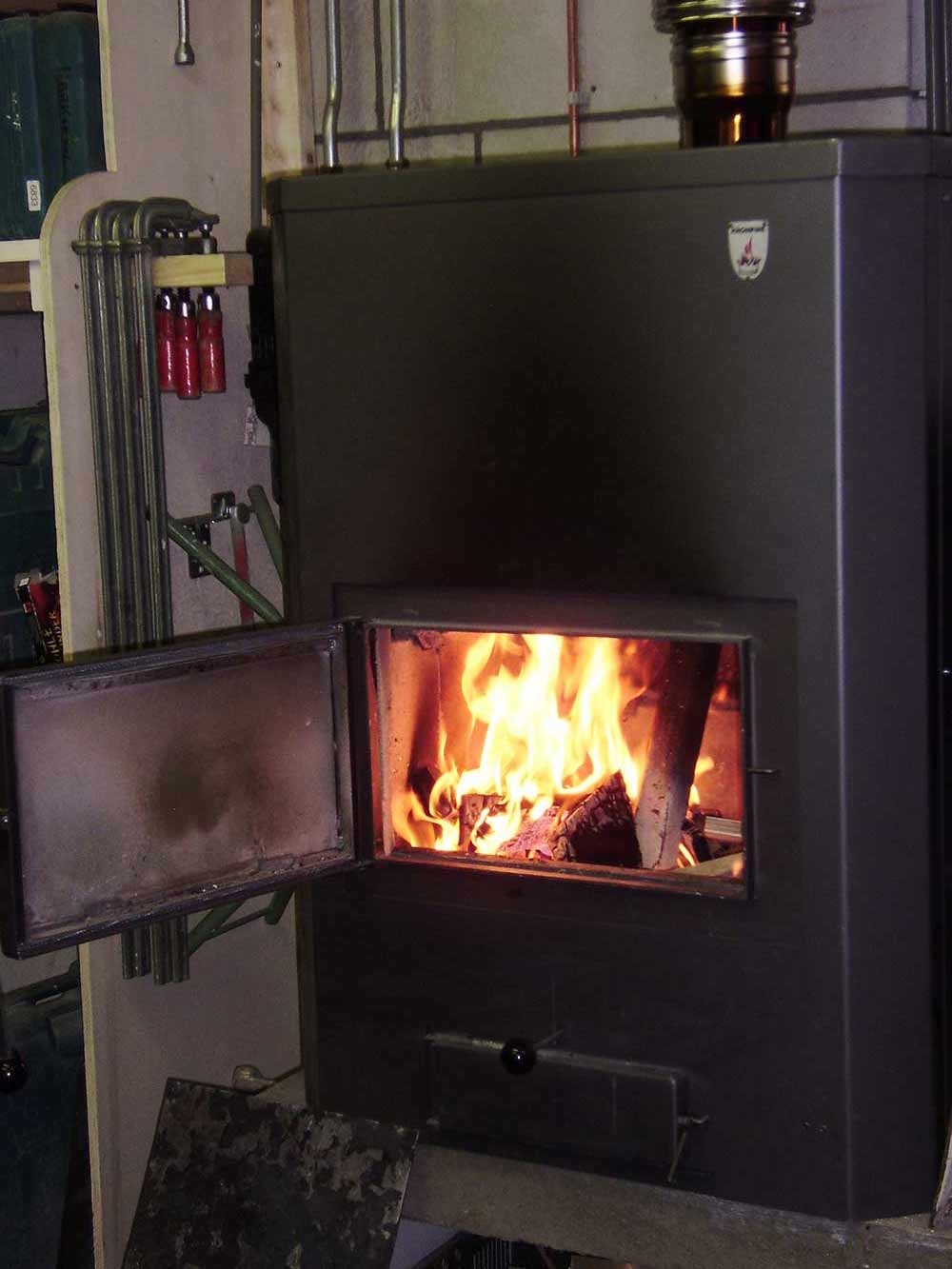 Koeleman Bouw Groene daken, Zonnepanelen en duurzame installaties - Houtgestookte CV ketels en houtvergassers