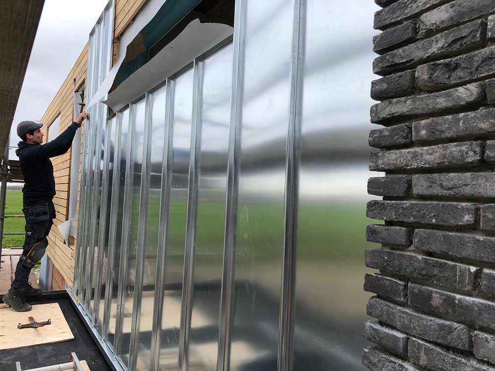 Koeleman Bouw Nieuwbouw woning met groot balkon Waterhoen Noorden